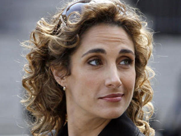Actress Melina Kanakaredes. of the CBS television series "CSI:NY," stops while filming a 2007  episode in Foley Square, in New York. (AP Photo) 