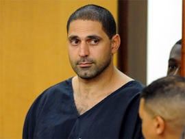Elias Abuelazam, 33, attends an extradition hearing in Fulton County Superior Court in Atlanta, Aug. 13, 2010. Abuelazam said he will not fight the extradition request to send him back to Michigan to face charges of deadly stabbings.