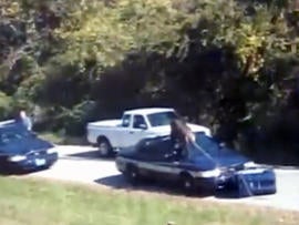 Chimpanzee vs. Police Car? 300-Pound Chimp Attacks Police Car