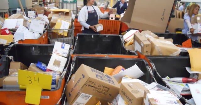 Bulk Mail Quite a Busy Day at the Post Office CBS News