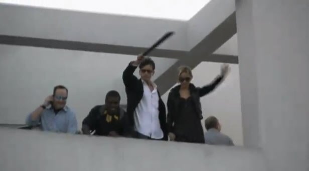 Charlie Sheen waves machete on rooftop [VIDEO], declares "Free at last