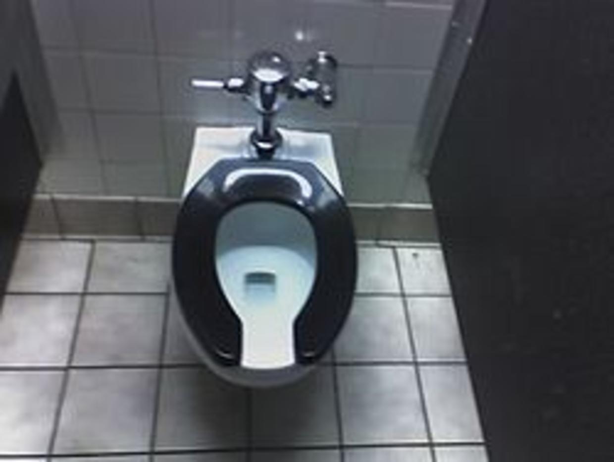 Man glued to toilet seat in WalMart bathroom CBS News