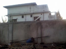 An image obtained by Reuters shows the outside of Osama bin Laden's Abbottabad complex after the U.S. raid that killed the al Qaeda leader. Reuters says it obtained the images from a Pakistani guard who entered the compound in the early morning hours of Monday, May 2.