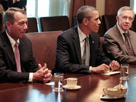 WASHINGTON, DC - JULY 14: Speaker of the House John Boehner (R-OH), President Barack Obama, Senate Majority Leader Harry Reid (D-NV) and Senate Minority Leader Mitch McConnell (R-KY) sit down with other administration officials and members of Congress for a meeting in the Cabinet Room at the White House July 14, 2011 in Washington, DC. Obama and the Congressional leaders are working to strike a deal to raise the debt limit while controlling spending in the federal budget.