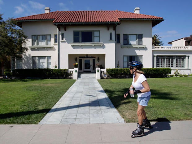 Girlfriend, son die days apart at tycoon's Calif. mansion