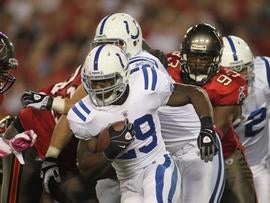 TAMPA, FL - OCTOBER 03: Running back Joseph Addai #29 of the Indianapolis Colts runs the ball against the Tampa Bay Buccaneers at Raymond James Stadium on October 3, 2011 in Tampa, Florida. (Photo by Marc Serota/Getty Images)