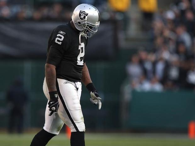 OAKLAND, CA - JANUARY 03: JaMarcus Russell #2 of the Oakland Raiders walks off the field against the Baltimore Ravens during an NFL game at Oakland-Alameda County Coliseum on January 3, 2010 in Oakland, California. (Photo by Jed Jacobsohn/Getty Images) 