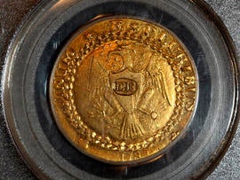 A rare 1787 gold Brasher doubloon, which sold for $7.4 million, one of the highest prices ever paid for a gold coin, is seen in New Orleans Dec. 9, 2011, in a photo provided by Blanchard and Company, Inc. Blanchard and Co., the New Orleans-based coin and precious metals company that brokered the deal, said the doubloon was purchased by a Wall Street investment firm.
