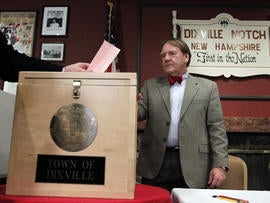A voter cast his vote in the first-in-the-nation presidential primary