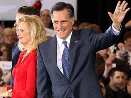 Former Massachussetts Gov. Mitt Romney waves to supporters during a primary night gathering at the Suburban Collections Showplace Feb. 28, 2012, in Novi, Mich.
