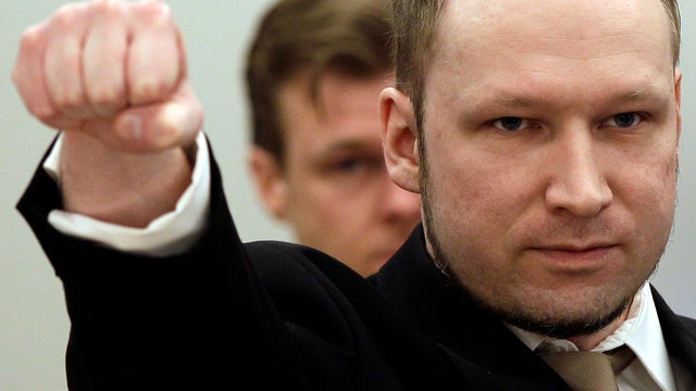 Accused Norwegian Anders Behring Breivik gestures as he arrives at the courtroom April 16, 2012, in Oslo, Norway.