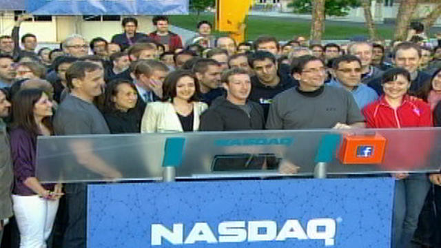 CEO Mark Zuckerberg and others from Facebook on morning company went public. Zuckerberg rang NASDAQ opening bell from stage in company's campus in Silicon Valley, Calif. 