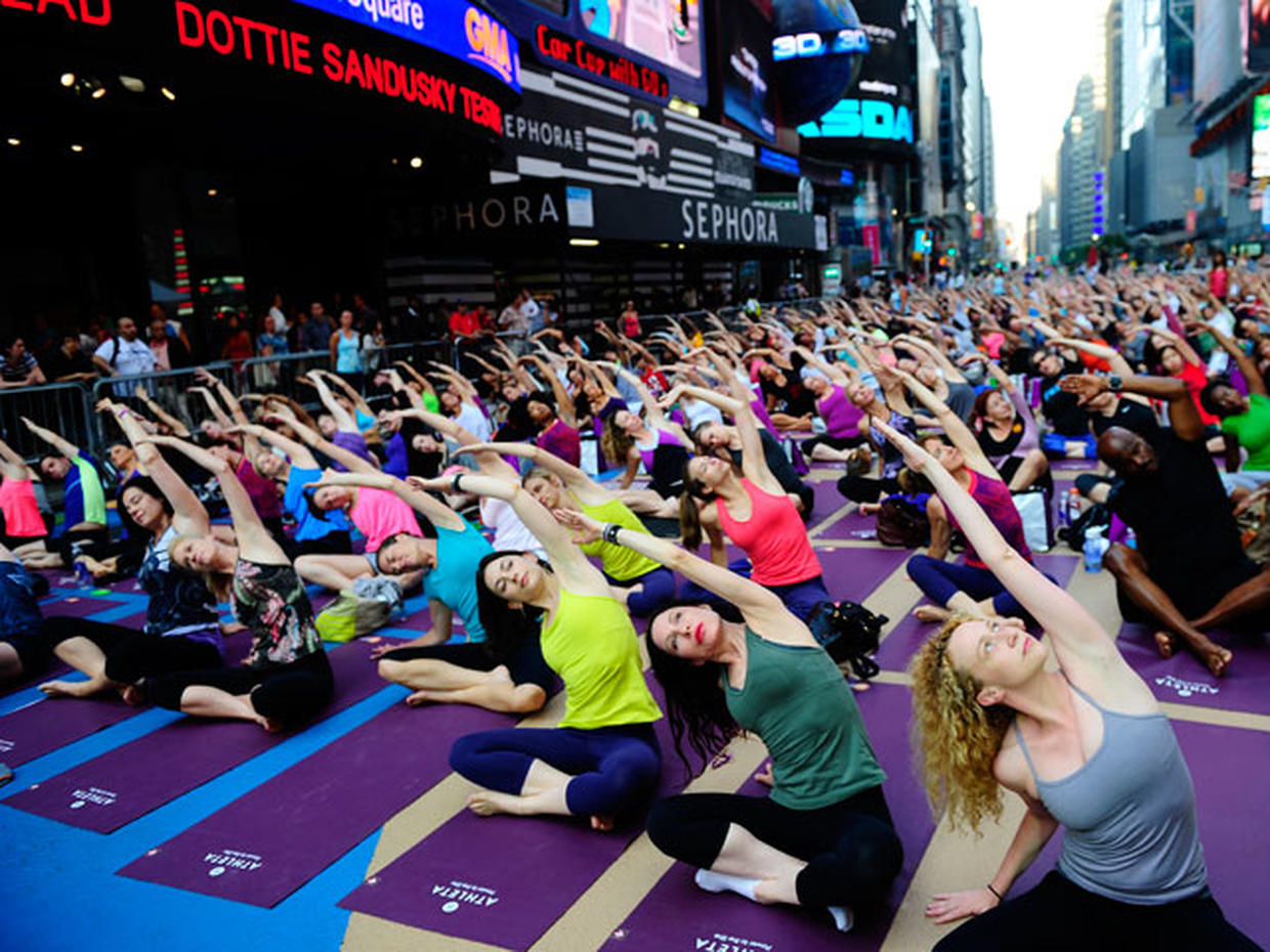 Yoga takes over Times Square for summer solstice Photo 1 Pictures