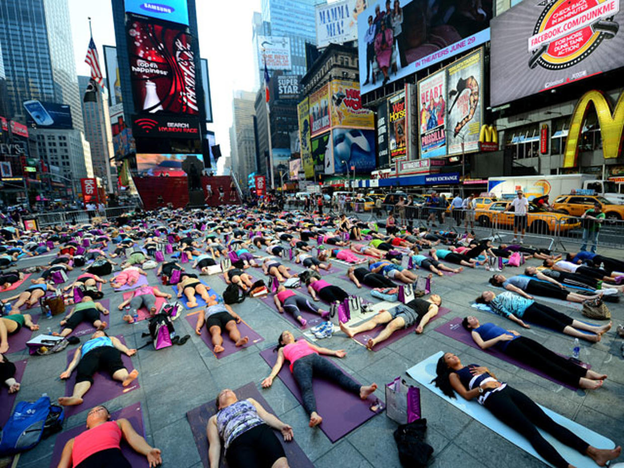 Yoga takes over Times Square for summer solstice Photo 1 Pictures