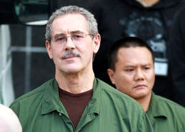 In this March 6, 2012 file photo, R. Allen Stanford leaves the Bob Casey Federal Courthouse in Houston, Texas.