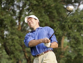 AT&T Chairman and CEO Randall Stephenson takes a shot during the AT&T National Earl Woods Memorial Pro-Am in 2007 at Congressional Country Club in Bethesda, Md.