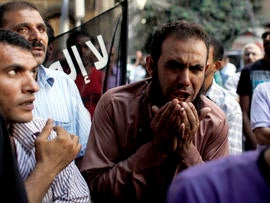 An Egyptian man chants slogans during a demonstration in front of the U.S. Embassy in Cairo Sept. 12, 2012.