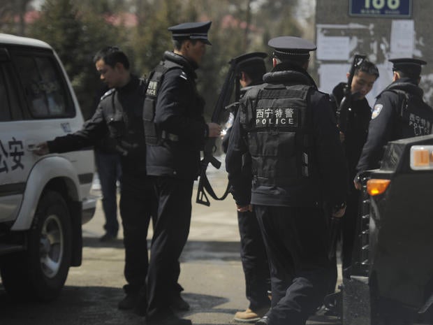 Chinese police patrol in Banma, Qinghai province