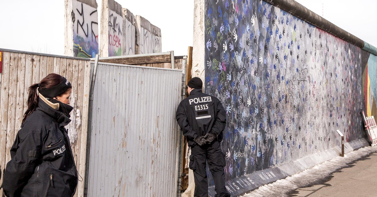 Despite protests, more of the Berlin Wall torn down CBS News