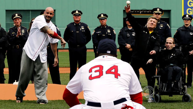 Steve Byrnes throws the opening pitch at Fenway Park.