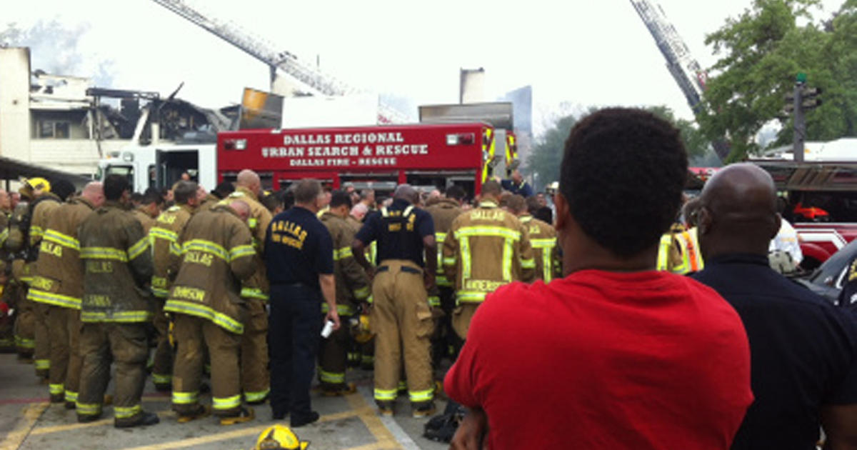 Firefighter killed in massive Dallas condo fire CBS News