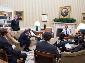 President Obama meets with senior advisers in the Oval Office to discuss the situation in Syria Aug. 30, 2013.