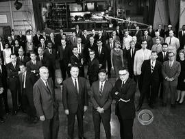 Walter Cronkite and some of his staff.