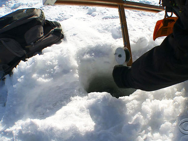 Thousands brave Minnesota's freezing temps for ice-fishing contest ...