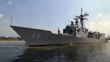 In this U.S. Navy handout photo, the USS Vandegrift arrives Nov. 19, 2003, in Ho Chi Minh City, Vietnam, for a scheduled port visit.