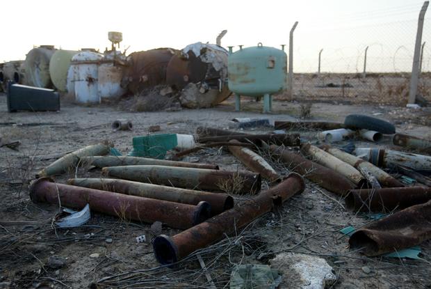 Discarded shells and cement-filled tanks litter the Al-Muthanna State Establishment, a Saddam Hussein-era chemical weapons manufacturing facility 40 miles northwest of Baghdad, after UN weapons inspectors entered the complex 