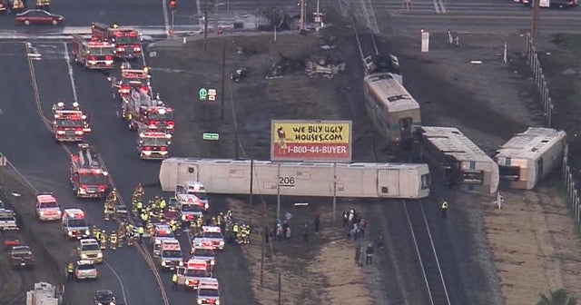 Dozens hurt after California commuter train collides with truck CBS News