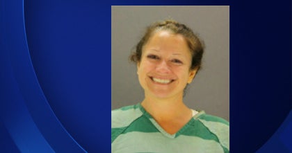 Dallas woman explains smiling mugshot after arson arrest for fire at