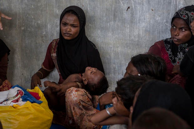 Rohingya women and children are seen after arriving at the port in Julok village, May 20, 2015, in Kuta Binje, Aceh Province, Indonesia