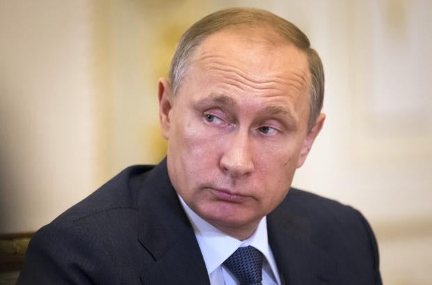 Russian President Vladimir Putin listens to the Chinese vice premier during talks at the Saint Petersburg International Investment Forum in Saint Petersburg, Russia, June 18, 2015.