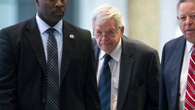 Surrounded by U.S. marshals, former Republican Speaker of the House Dennis Hastert leaves the Dirksen Federal Courthouse Oct. 28, 2015, in Chicago.