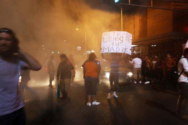 Protesters block streets following Donald Trump rally and speech at Albuquerque Convention Center on May 24, 2016 