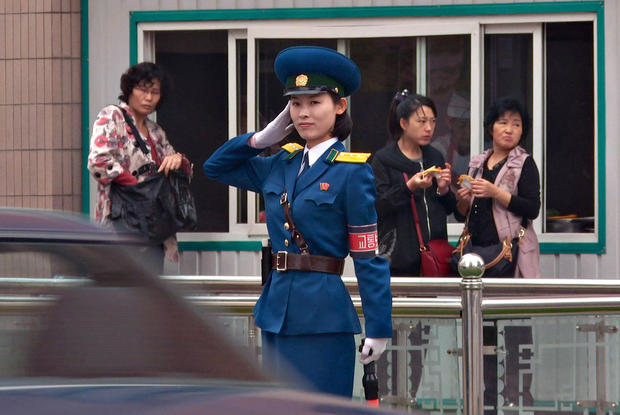 North Korea Traffic Ladies - Planting day - Inside North Korea - Pictures - CBS News