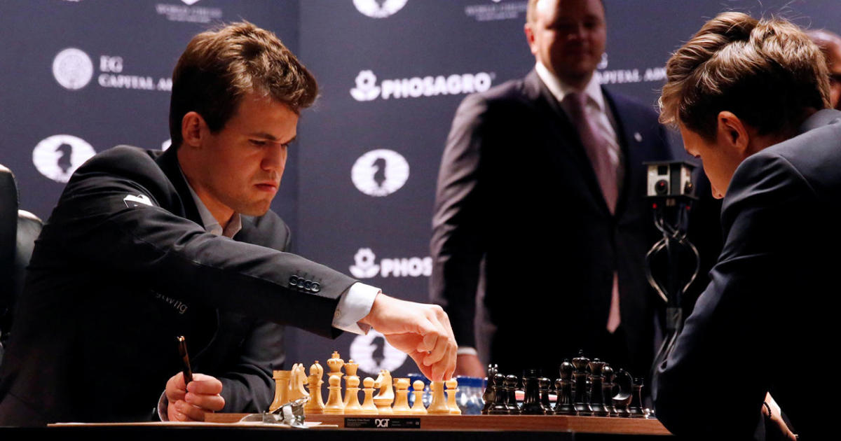 World chess champion Magnus Carlsen defends his title - CBS News