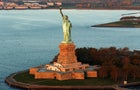 The sun lights the Statue of Liberty in New York Nov. 2, 2016. 