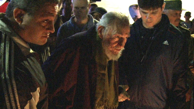Former Cuban President Fidel Castro arrives for the inauguration of the nonprofit cultural center Kcho Romerillo, Laboratory for Art, in Havana in this image capture from a video taken on Jan. 8, 2014.