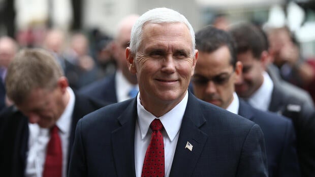 Vice President Mike Pence walks with members of his delegation ahead of bilateral talks during the 53rd Munich Security Conference in Munich, Germany, Feb. 18, 2017.