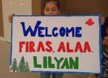 welcome-sign-syrian-refugees.jpg