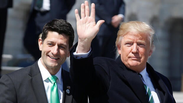 President Trump waves with House Speaker Paul Ryan, R-Wisconsin, after attending a Friends of Ireland reception on Capitol Hill in Washington March 16, 2017.