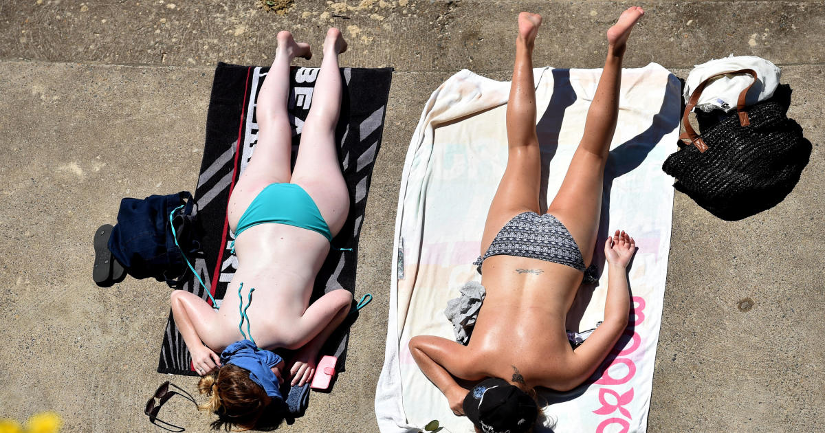 Topless women sunbathing won't be bothered by beach patrol -
