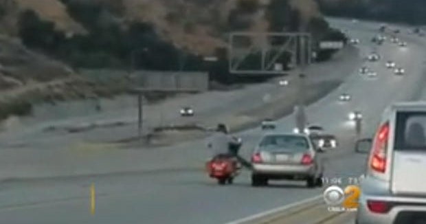 Video Motorcyclist's road rage kick touches off 2car crash CBS News