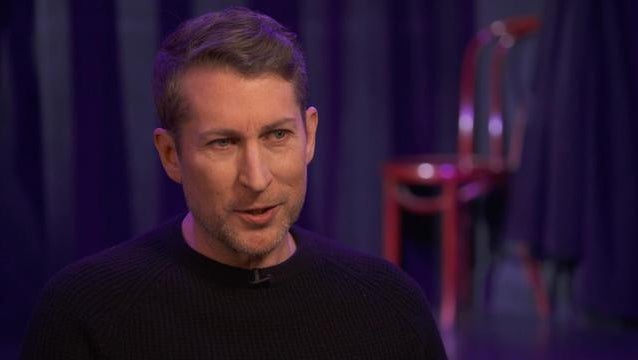 Comedian Scott Aukerman talks podcasting empire and turning mainstream TV into comedy CBS News