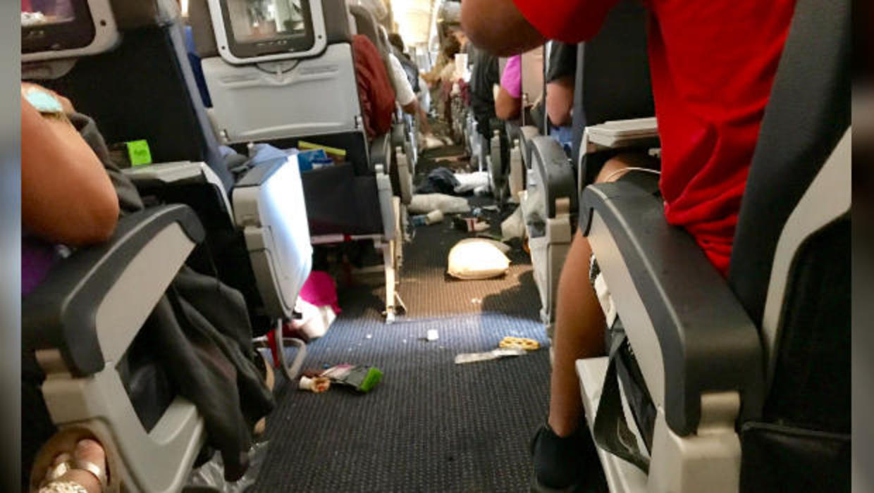 Images show aftermath of airliner hit by severe turbulence CBS News