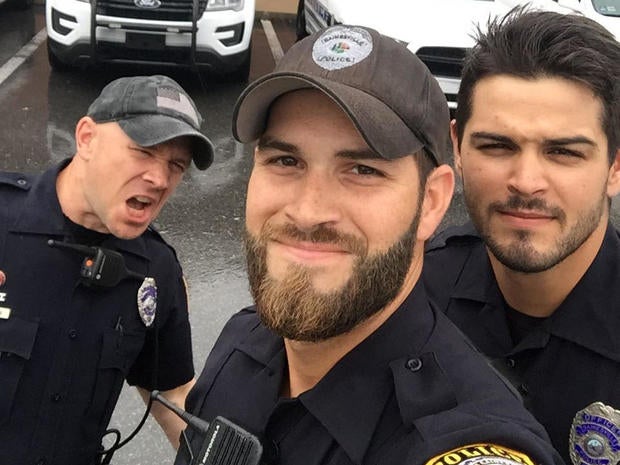 Three officers with the police department in Gainesville, Florida - identified as Officers Nordman, Hamill and Rengering - are seen in a photo posted to the department's Facebook page on Sept. 10, 2017.
