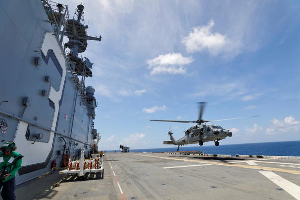 A Navy MH-60S Sea Hawk lifts off from the flight deck of the USS Kearsarge as U.S. military continues to evacuate from the U.S. Virgin Islands in advance of Hurricane Maria