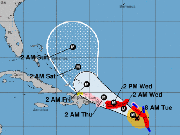 A map shows the probable path for Hurricane Maria as of 8 a.m. ET on Sept. 19, 2017. The M stands for "major hurricane." The red areas represent hurricane warnings. The blue areas represent tropical storm warnings. The pink areas represent hurricane watches. The yellow areas represent tropical storm watches.